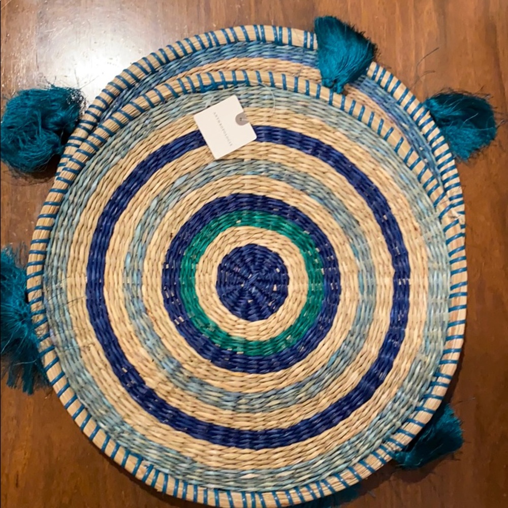 Two Anthropologie place mats